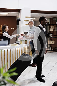 Friendly hotel staff welcomes guests