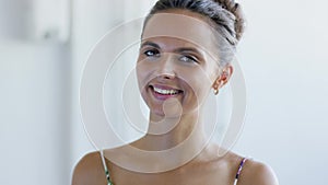 Friendly lady with elegant hairdo