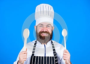 Friendly look. Vegetarian. Mature chef with beard. Bearded man cook in kitchen, culinary. Healthy food cooking. Chef man