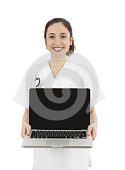 Friendly medical doctor or nurse showing a laptop with copy space