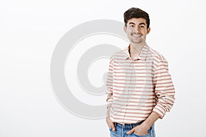 Friendly neighbour asking how is everything. Indoor shot of confident cheerful caucasian man with beard and moustache