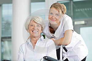 friendly nurse and senior patient photo