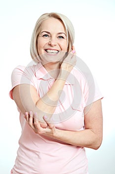 Friendly smiling middle-aged woman isolated on white background