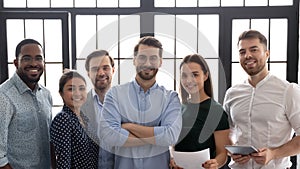 Group portrait of successful multiethnic business team in office