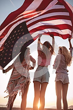 Friends carrying american flag on the beach