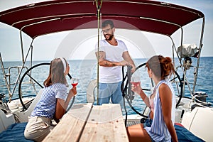 Friends chill on a yacht