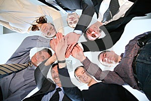 Friends circle with hands