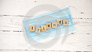 Friends ` day.words from wooden cubes with letters photo