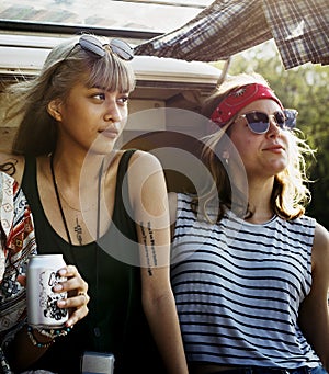 Friends Drinking Alcohol Beers Together on Road Trip Journey