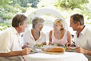 Friends Eating An Al Fresco Lunch