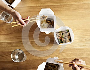 Friends eating Chowmein together