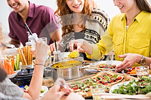 Friends eating vegetarian breakfast