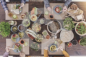 Friends eating vegetarian dinner