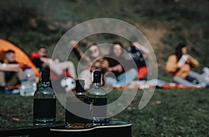 Friends enjoying a casual outdoor gathering with drinks in focus