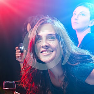 Friends enjoying a party in nightclub
