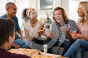 Friends enjoying pizza party