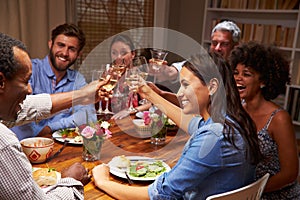 Friends at an evening dinner party