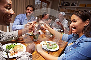 Friends at an evening dinner party