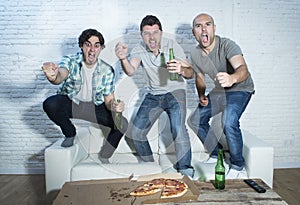 Friends fanatic football fans watching game on tv celebrating goal screaming crazy happy