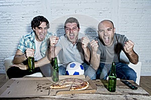 Friends fanatic football fans watching game on tv celebrating goal screaming crazy happy