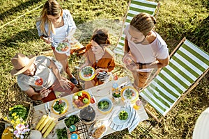 Friends during a festive lunch in the garden