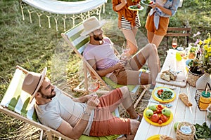 Friends during a festive lunch in the garden