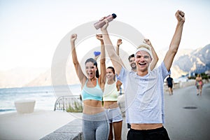 Friends fitness training together outdoors living active healthy