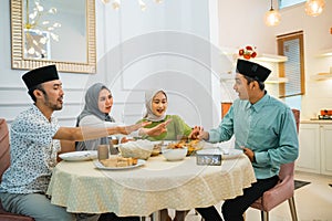 friends forbid man from taking food before breaking the fast photo