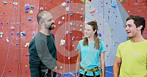 Friends forming hand stack during bouldering 4k