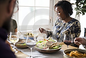 Friends gathering having Italian food together