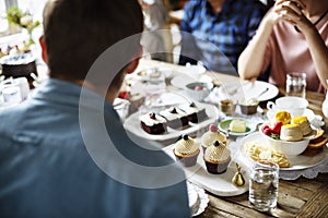 Friends Gathering Together on Tea Party Eating Cakes Enjoyment h