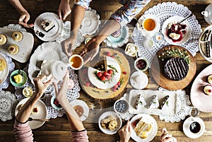 Friends Gathering Together on Tea Party Eating Cakes Enjoyment h