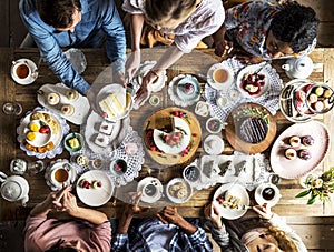 Friends Gathering Together on Tea Party Eating Cakes Enjoyment h