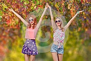 Friends Girl Having Fun. Fall Fashion.Outdoor Park