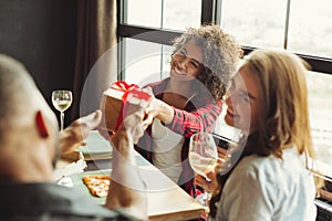 Friends giving gifts