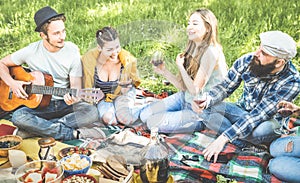 Friends group having fun outdoor cheering at bbq picnic barbecue