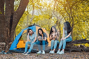 Friends Group of Young Asian women camping and resting