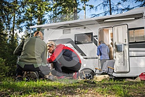 Friends Hanging Next to Their RV Camper Van