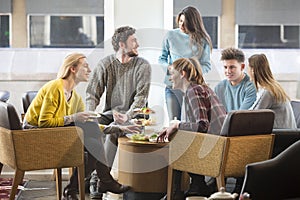 Friends having afternoon tea in a cafe