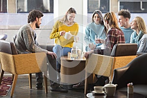 Friends having afternoon tea in a cafe