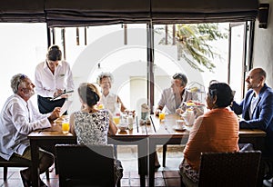 Friends having breakfast at a hotel