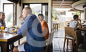 Friends having breakfast at a hotel