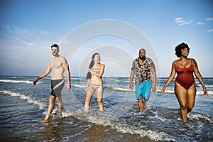 Friends having fun on the beach