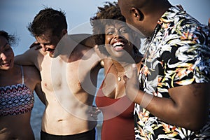 Friends having fun on the beach