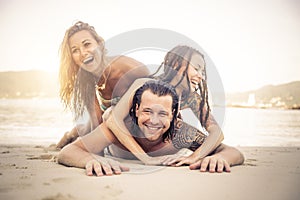 Friends having fun on the beach