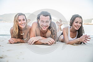 Friends having fun on the beach