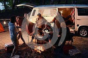 Friends having fun during camping