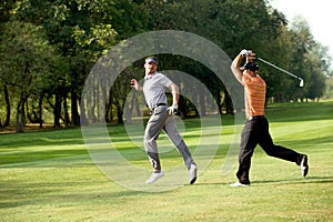 Friends having fun in golf course