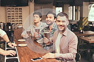 Friends having fun in pub