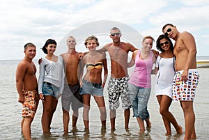 Friends having fun at the sea